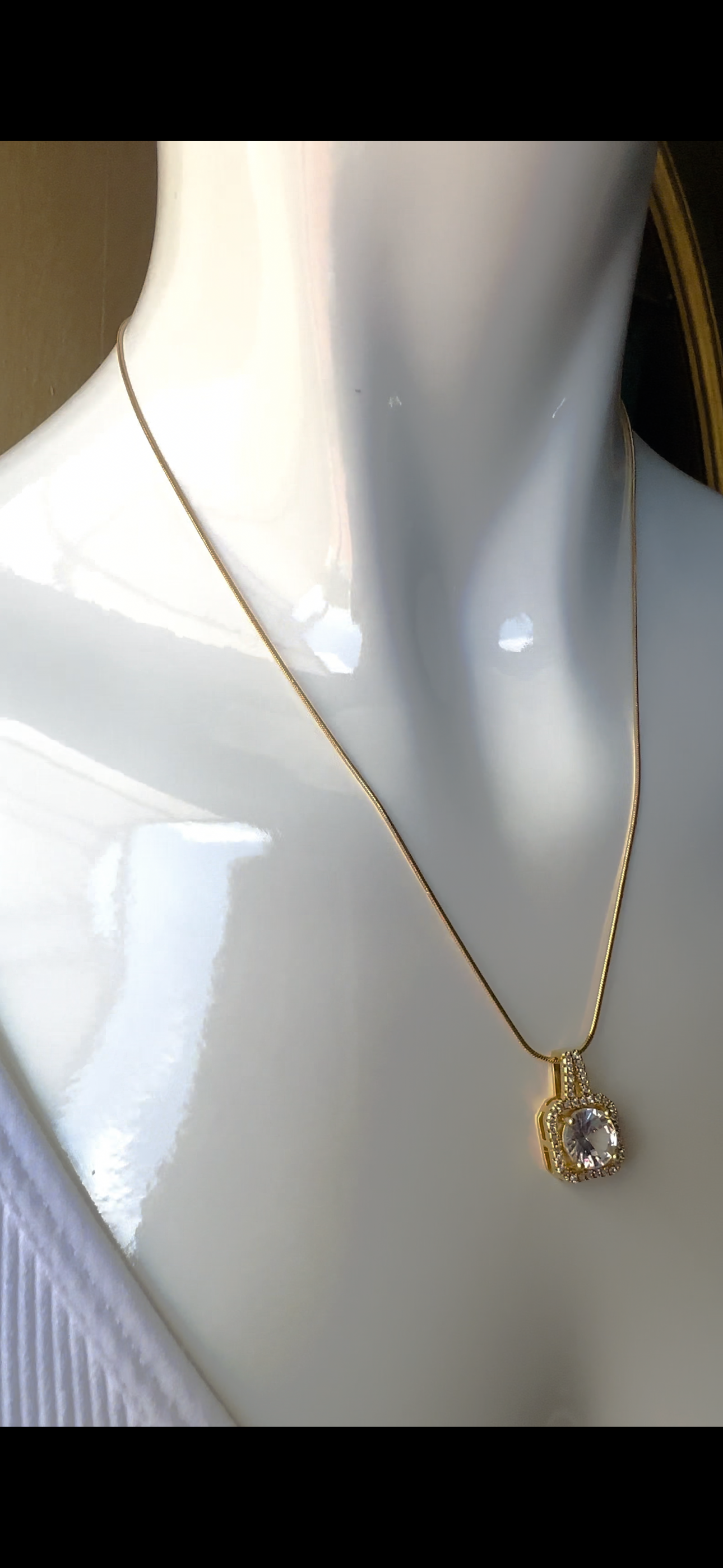 Stainless steel necklace with round stone and square drop oendant